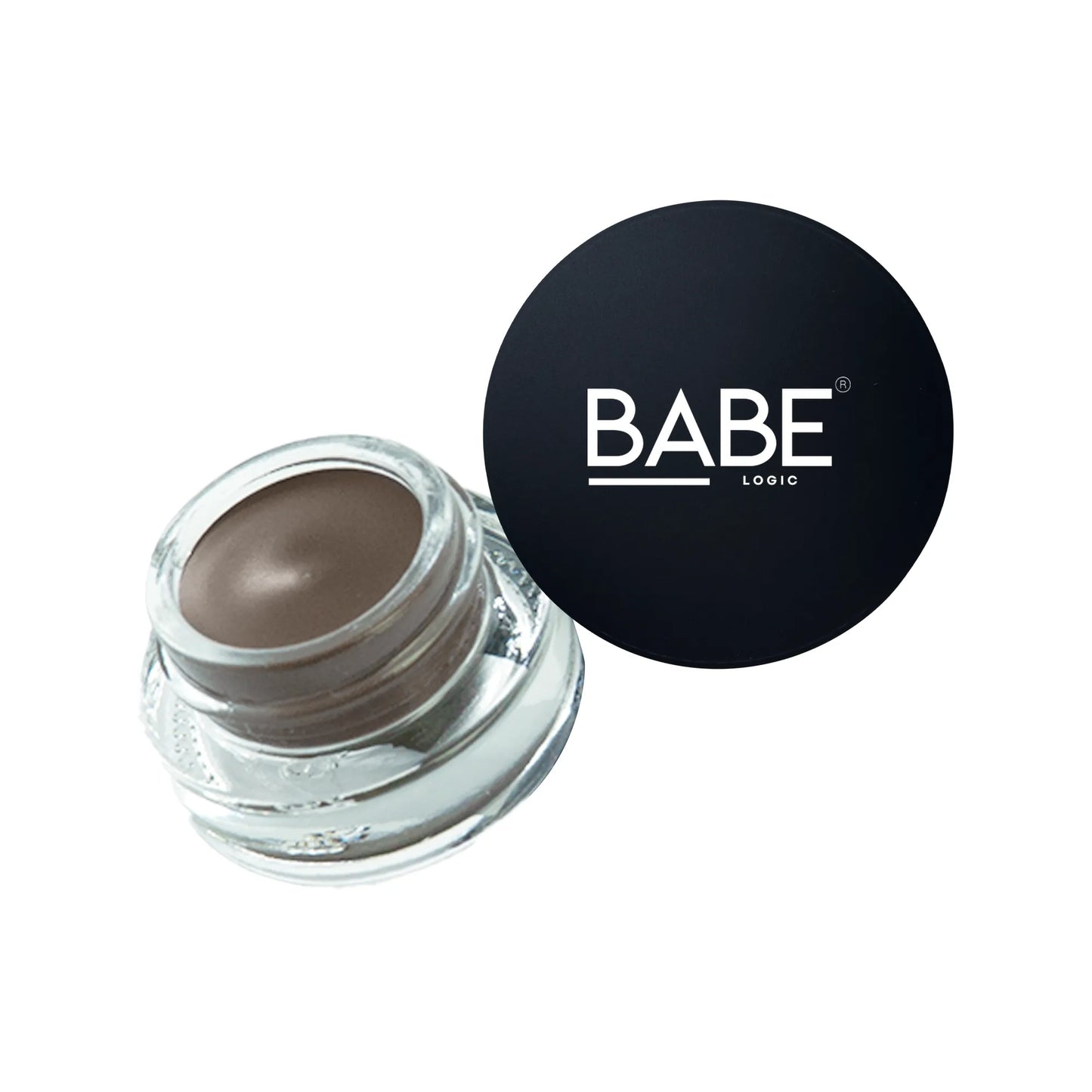 Brow Pomade in glass jar with black lid for shaping and defining eyebrows.