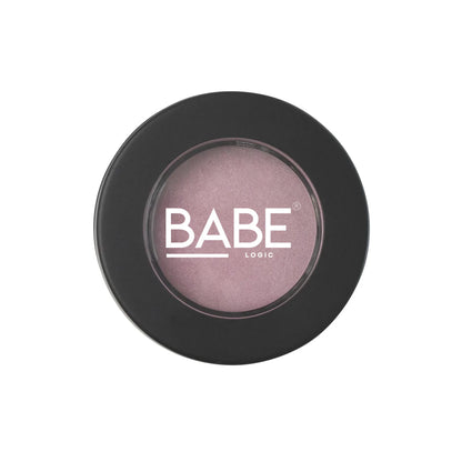Talc-free single pan eyeshadow in round black compact case.