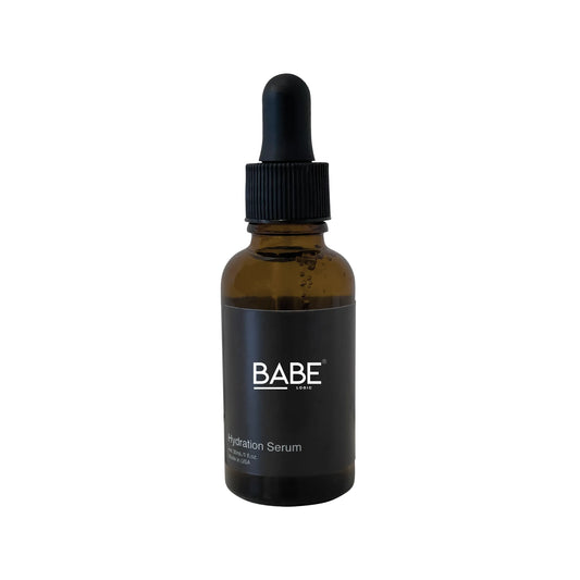 Brown glass bottle of hydration serum with black dropper cap, labeled "Babe Hydration Serum."