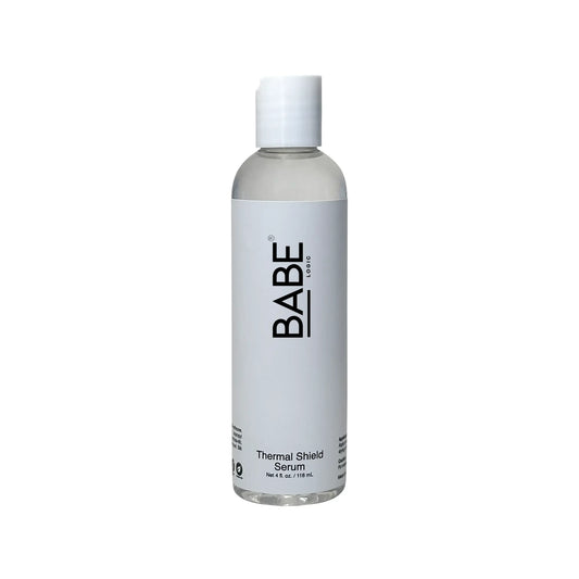 Thermal Shield Serum bottle for heat protection and hair nourishment.