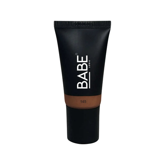Black tube of tinted moisturizer by Babe, offering sheer coverage and essential hydration for all skin types.