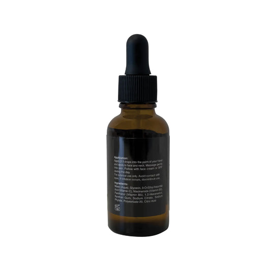 Niacinamide Vitamin Boost Serum bottle with dropper, 1 fl. oz., paraben-free, vegan; improves skin tone and texture.