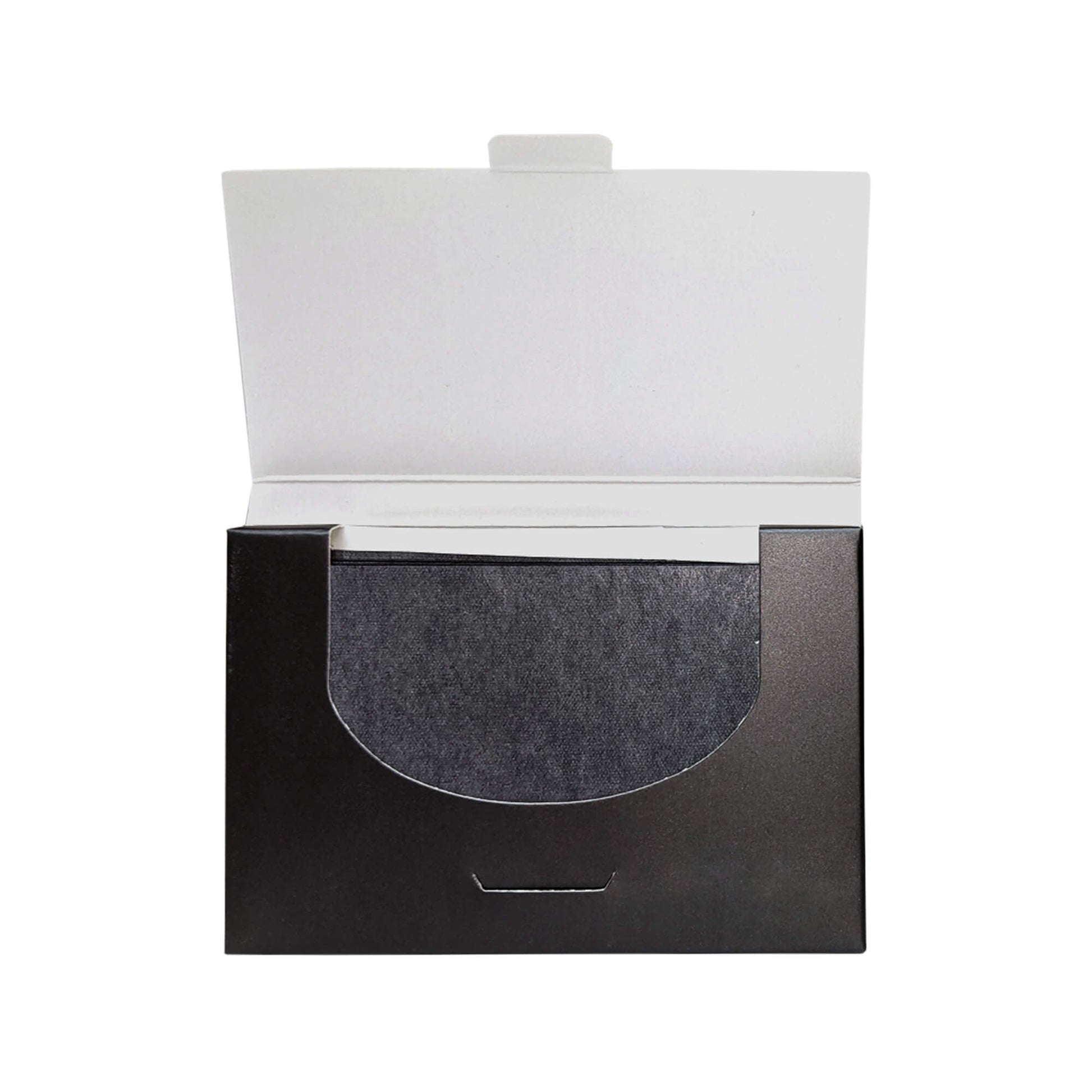 Open package of touch-up blotting papers for absorbing excess oil and shine.