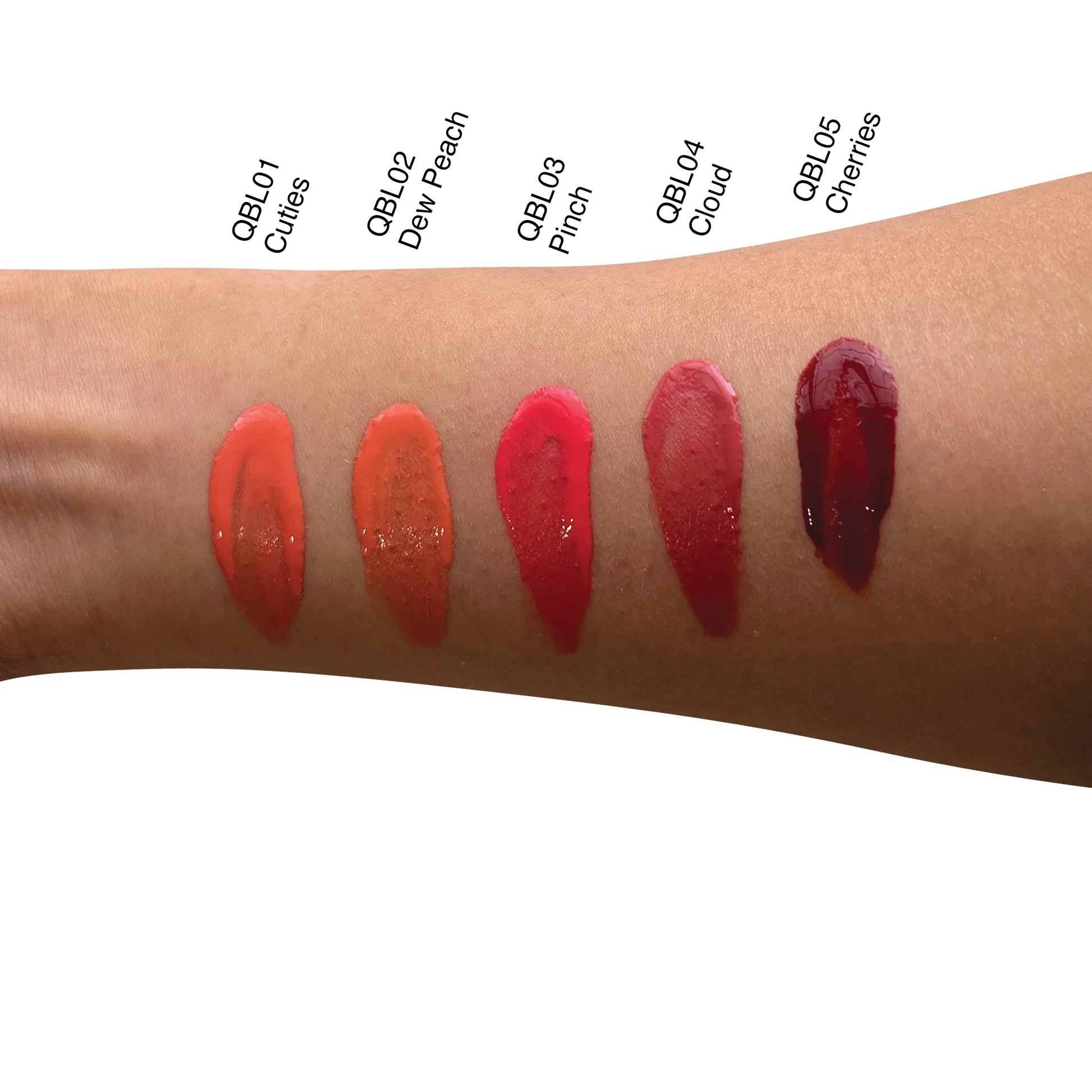 Swatches of liquid blush shades on arm showcasing natural, dewy colors for a flawless glow.