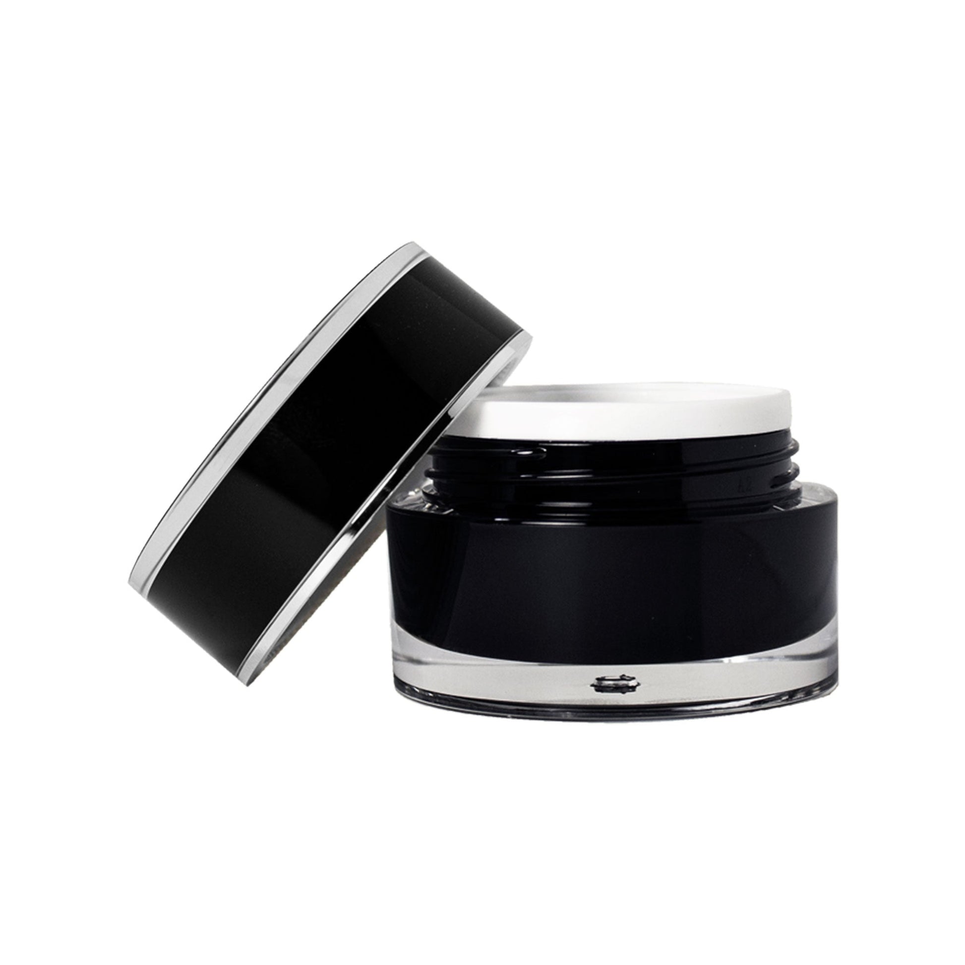 Black jar of Active Eye Cream with open lid, showcasing a lightweight, non-greasy formula enriched with Panthenol and Safflower Oil to soothe and depuff eyes.