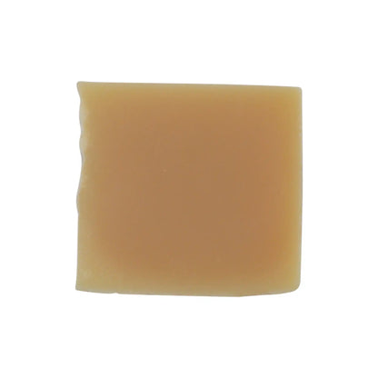 Natural soap bar with soothing and revitalizing ingredients for gentle cleansing.