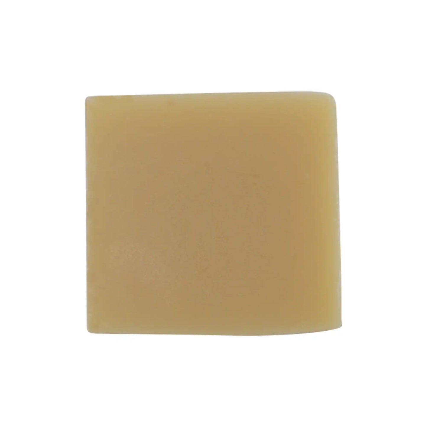 Natural soap bar with soothing ingredients for skin cleansing and nourishment.