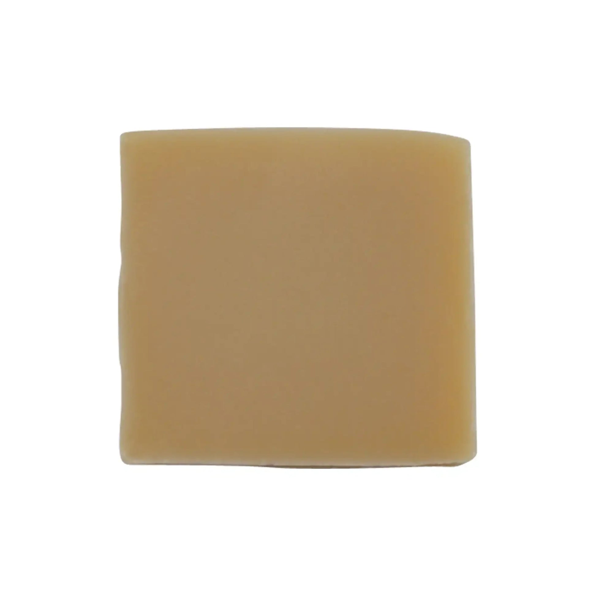 Natural soap bar featuring soothing and revitalizing ingredients like aloe vera, tea tree oil, and goat's milk for hydrated skin.