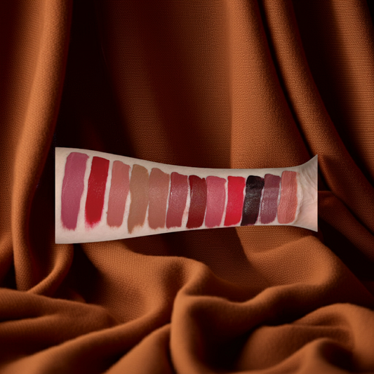 Matte lip stain swatches on arm showcasing vibrant, velvety finish and rich pigment