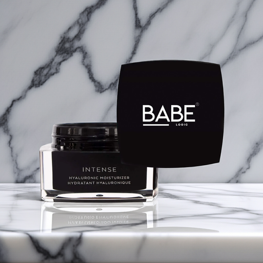 Babe Logic intense hyaluronic moisturizer jar with black lid on marble surface